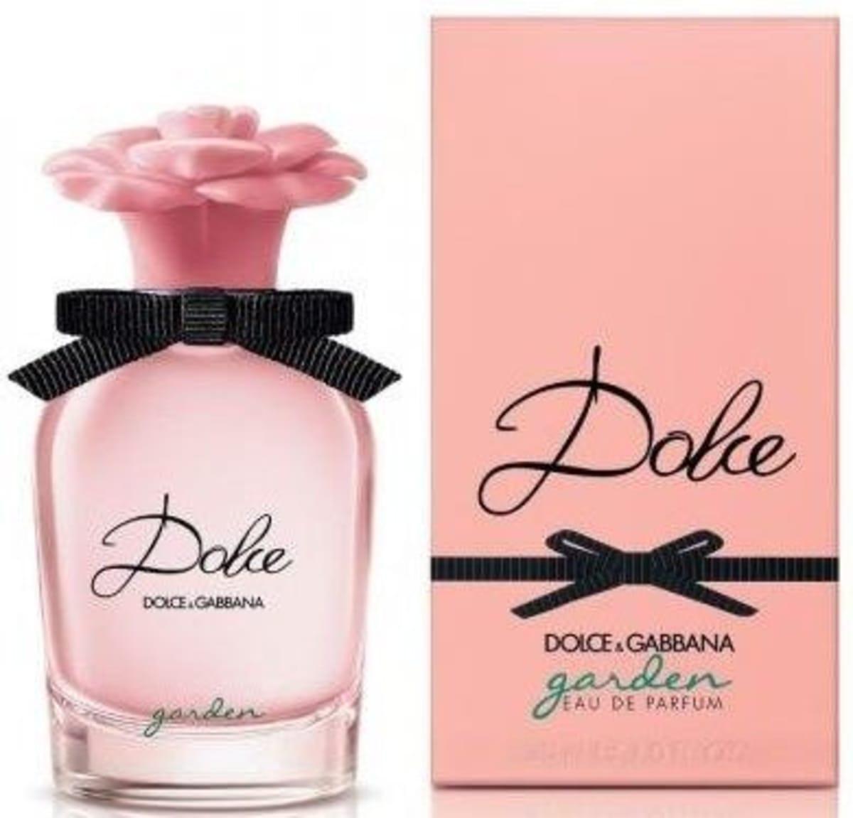 dolce&gabbana e.d.p.dolce garden by d&g 50 ml - foto 1 Bottiglia profumo rosa con tappo a forma di fiore e nastro nero, accanto a scatola rosa con logo Dolce Gabbana