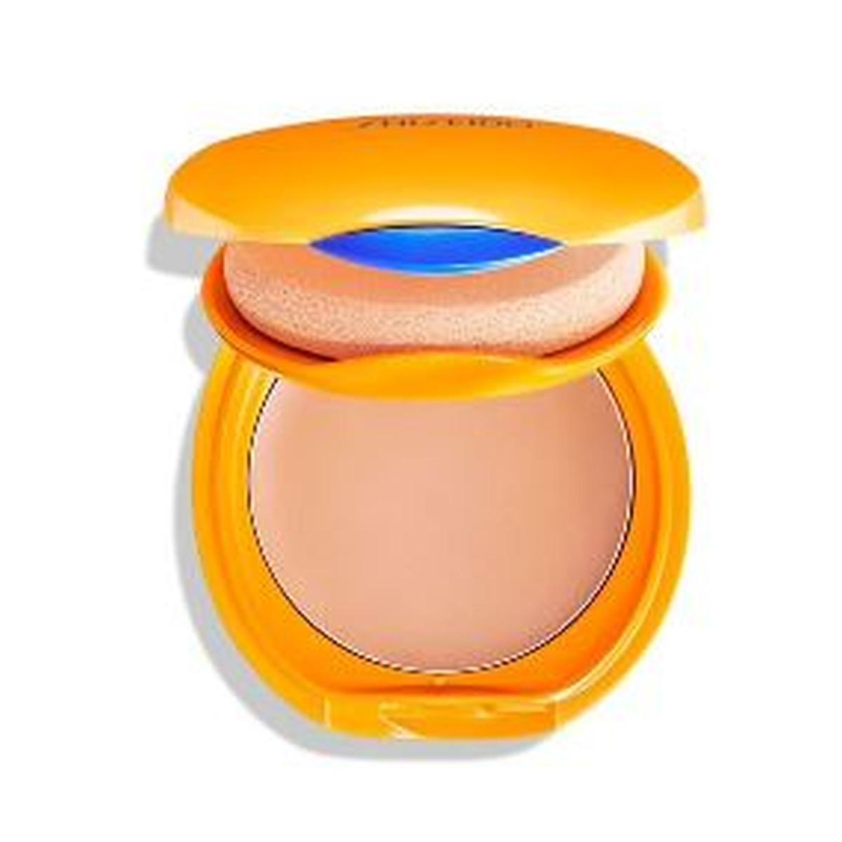 shiseido shiseido sun f.t.comp.nat.f10 12g - foto 1 Fondotinta compatto Shiseido Sun confezione gialla, aperto con disco polvere e applicatore