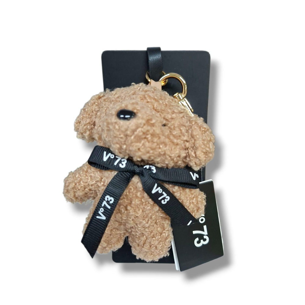 Portachiavi a forma di coniglio in peluche beige con fiocco nero e tag V°73