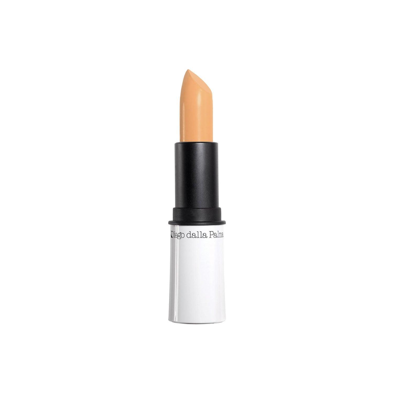 Correttore stick tubetto con tappo nero, barattolo bianco e applicatore color pesca