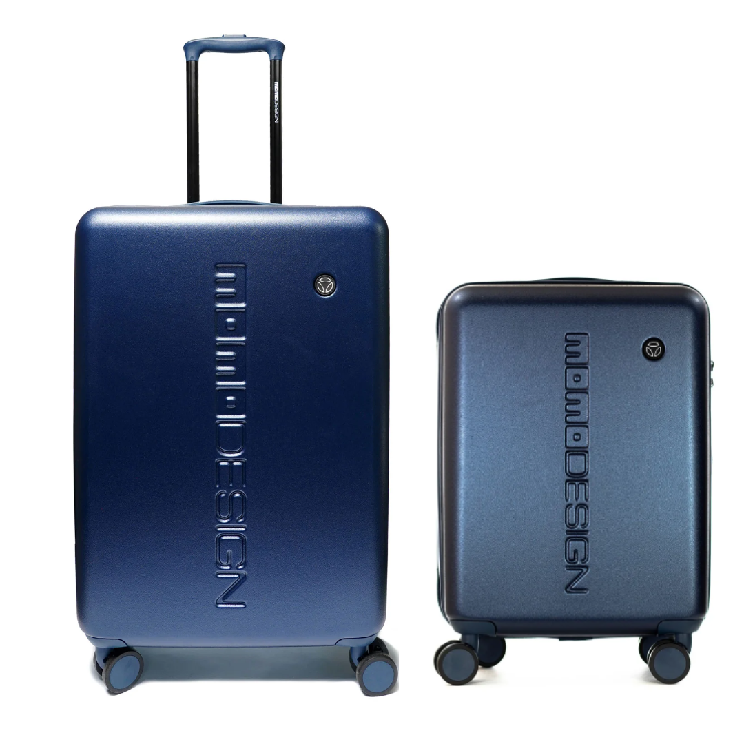 Due valigie blu navy MOMO DESIGN, una grande con manico telescopico e una piccola